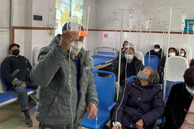 Patients receive IV drip treatment at a hospital, amid the outbreak of the coronavirus disease (COVID-19), at a village in Tonglu County, Zhejiang Province, China.