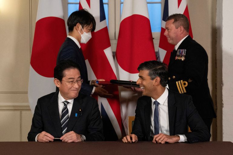 Britain's Prime Minister, Rishi Sunak and Japan's Prime Minister, Fumio Kishida, smile after signing a defence agreement