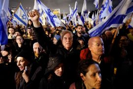 Israelis protest against Prime Minister Benjamin Netanyahu's new right-wing coalition