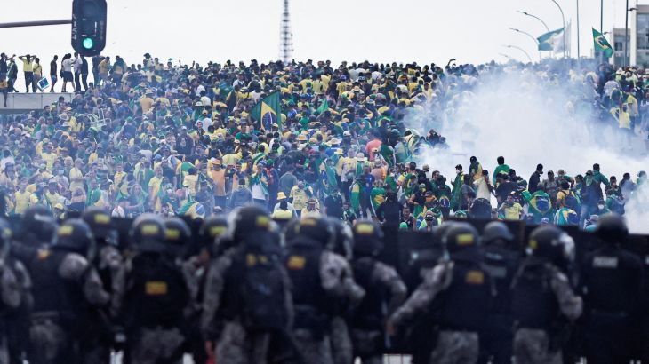 Brazil security forces stand guard as supporters of ex-President Jair Bolsonaro rally in Brasilia