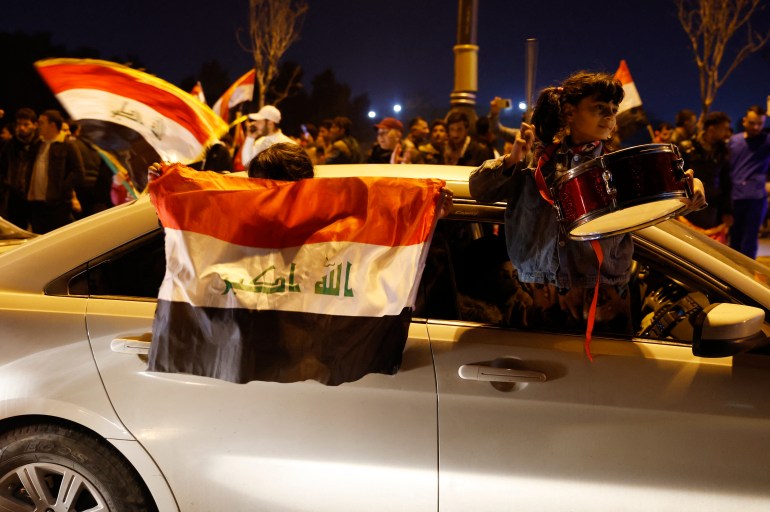 Les fans de raq célèbrent après avoir remporté la finale de la Coupe du Golfe arabe25 REUTERS/Khalid Al-Mousily