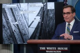 White House National Security Council Strategic Communications Coordinator John Kirby presents satellite images showing Russian railcars traveling between Russia and North Korea, during a press briefing at the White House in Washington, DC, US, January 20, 2023 [Leah Millis/ Reuters]