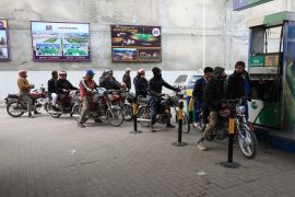 Long lines were reported outside petrol stations after people filled their tanks due to speculation that prices would soon rise. [Fayaz Aziz/Reuters]
