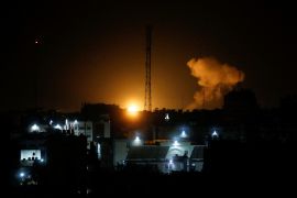 Smoke and flames rise during Israeli air attack in Gaza City on January 27, 2023 [Arafat Barbakh/Reuters]
