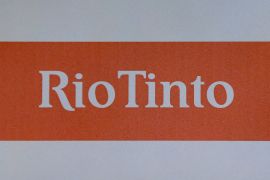 Logo of Rio Tinto. White letters on an orange background.