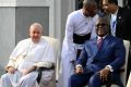 Pope Francis sits next to Democratic Republic of Congo's President Felix Tshisekedi as he attends the welcoming ceremony at the Palais de la Nation on the first day of his apostolic journey, in Kinshasa, Democratic Republic of Congo, January 31, 2023.