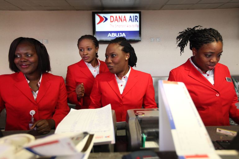 Dana airline staff work at the Lagos domestic airport