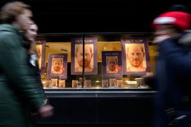 Pedestrians pass a display in the window of a book shop in London, United Kingdom, Tuesday, January 10, 2023, where Prince Harry&#39;s book Spare is seen prominently (Kirsty Wigglesworth/AP Photo)