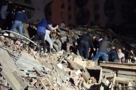 Rescuers search for victims of a 7.8-magnitude earthquake that hit Diyarbakir, in southeastern Turkey.