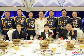 A picture released by North Korea&#39;s official news agency KCNA on February 8, 2023 shows leader Kim Jong Un, right, attending a banquet to mark the 75th anniversary of the Korean People&#39;s Army, with his wife Ri Sol-Ju, left, and daughter in the centre [File: KCNA via KNS/AFP]