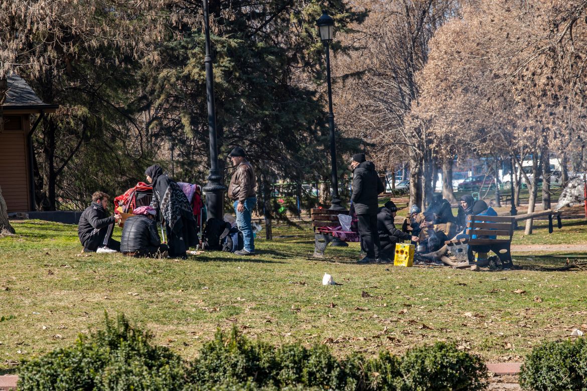 People gather in 100 Yil park near a mosque sheltering hundreds of people
