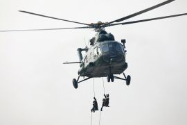 Soldiers repel down from a helicopter during a parade to mark the 74th Armed Forces Day in the capital Naypyidaw, Myanmar March 27, 2019 [File: Ann Wang/ Reuters]