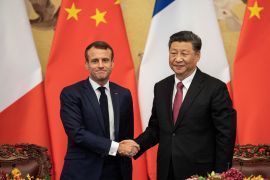 French President Emmanuel Macron shakes hands with Chinese President Xi Jinping following a signing ceremony at the Great Hall of the People in Beijing, China, November 6, 2019.