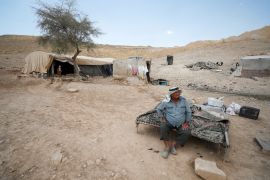 A Palestinian Bedouin sits near his tent near Jericho in the Israeli-occupied West Bank June 27, 2022