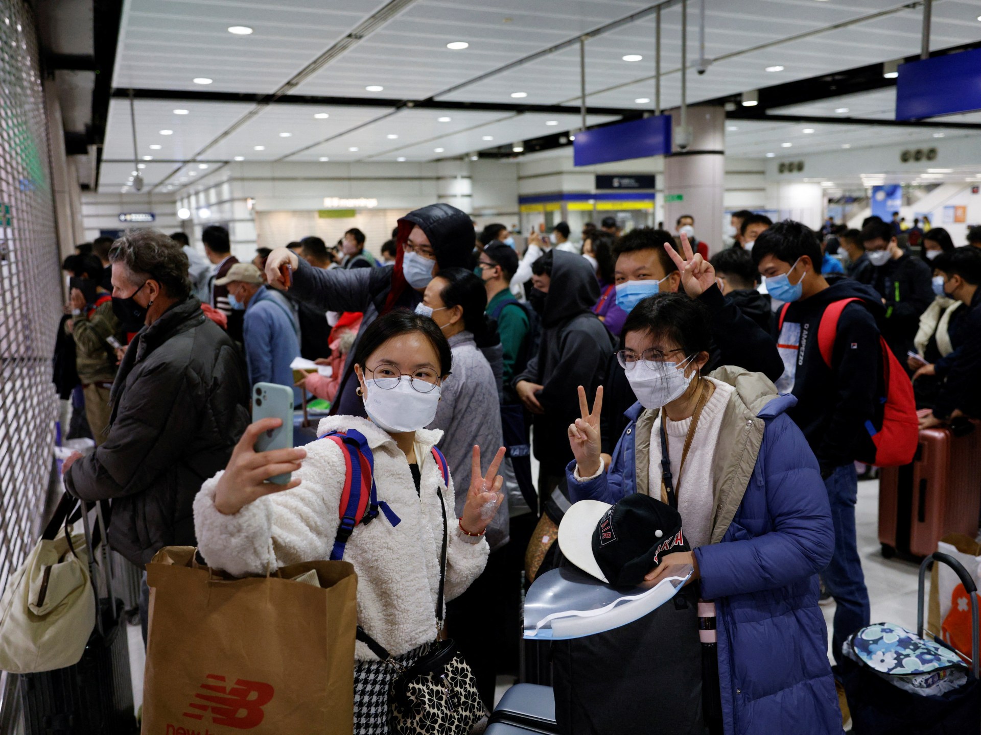 China to reopen borders with Hong Kong, Macau after COVID closure