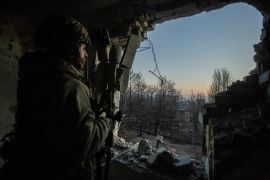 A Ukrainian serviceman looks on, amid Russia&#39;s attack on Ukraine, in Bakhmut [Yan Dobronosov/Reuters]