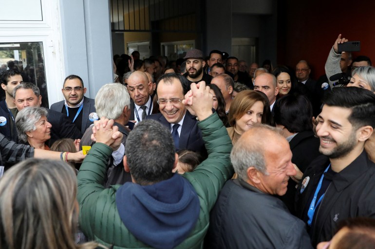 Cyprus independent presidential candidate Nikos Christodoulides meets with supporters outside a polling station on the day of the presidential election, in Geroskipou near Paphos, Cyprus, February 5, 2023. 