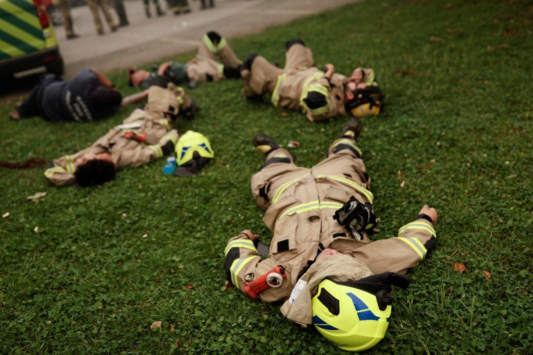 Chile firefighters take a break from fighting wildfires