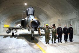 A fighter jet at the underground air force base Eagle 44 at an undisclosed location in Iran [Iranian Army/WANA/Handout via Reuters]