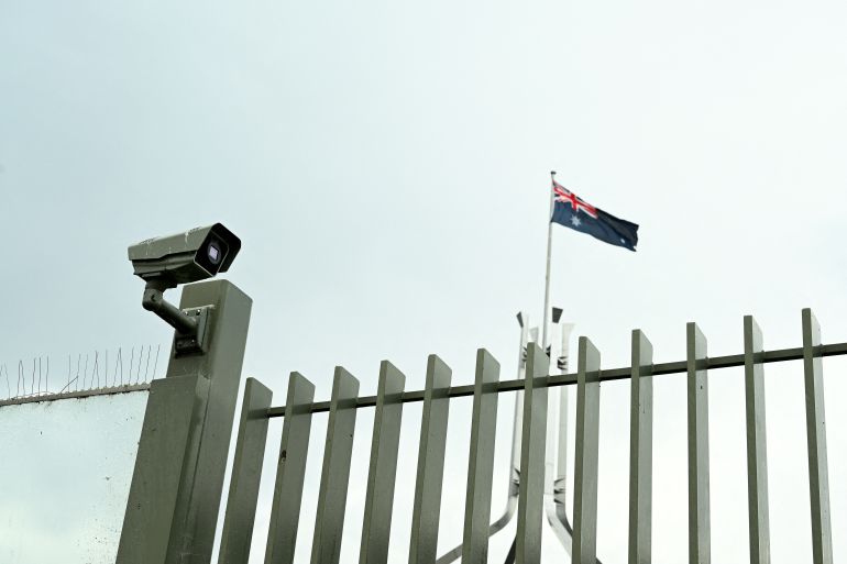 A security camera is seen outside Parliament House in Canberra, Australia, February 9, 2023