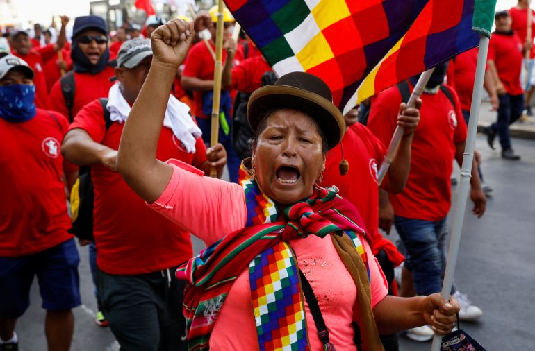 A woman gestures as demonstrators call for an indefinite nationwide strike during a march against the government of Peru's President Dina Boluarte, in Lima, Peru, February 9, 2023. REUTERS/Alessandro Cinque