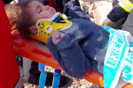 A?child?is rescued from the rubble after 150 hours in the aftermath of an earthquake in Hatay, Turkey, February 12, 2023 in this screen grab taken from a handout video. Turkish Health Ministry/ Handout via REUTERS. THIS IMAGE HAS BEEN SUPPLIED BY A THIRD PARTY.