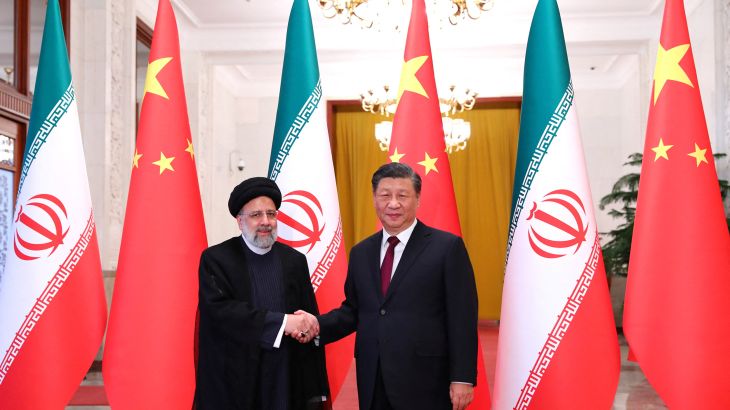 Iranian President Ebrahim Raisi shakes hands with Chinese President Xi Jinping during a welcoming ceremony in Beijing, China.