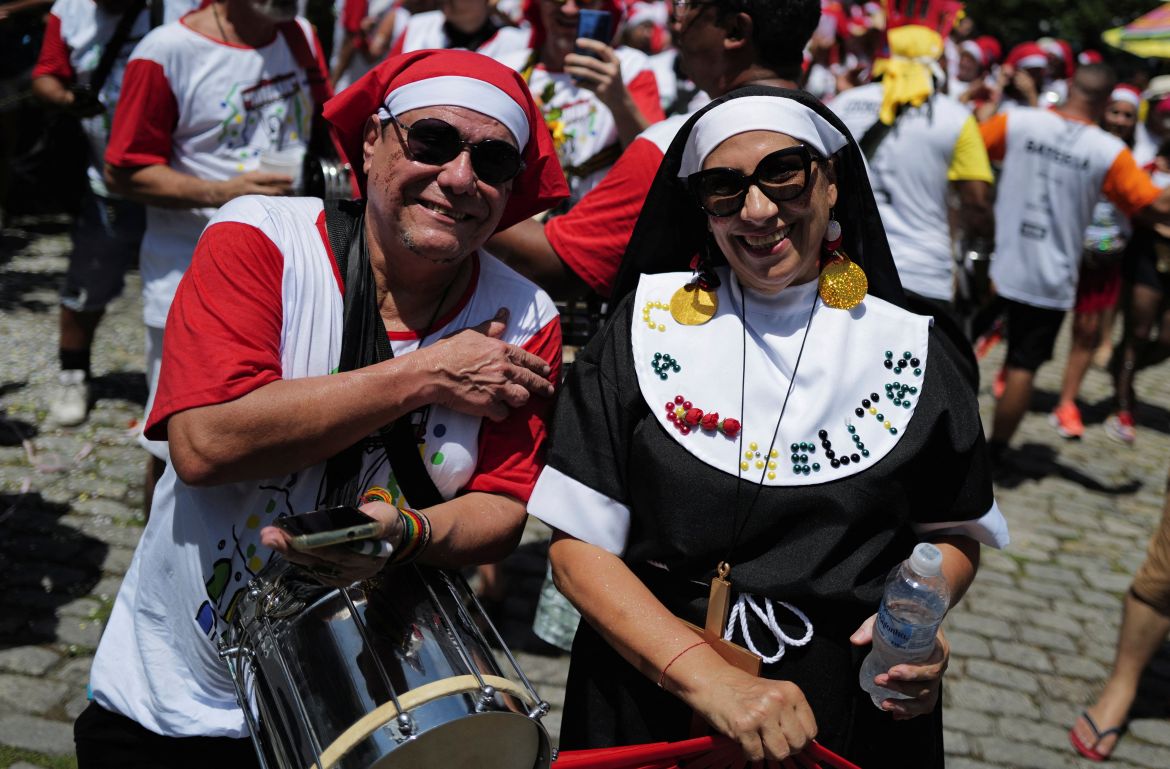 Revellers dressed as nuns in the Rio streets