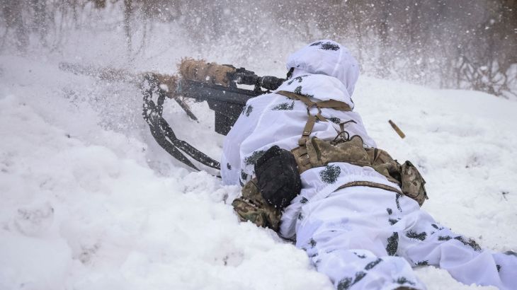A Ukrainian sniper fires from his position, as Russia's attack on Ukraine continues, in the front line city of Bakhmut, Ukraine February 17, 2023. REUTERS/Yevhen Titov