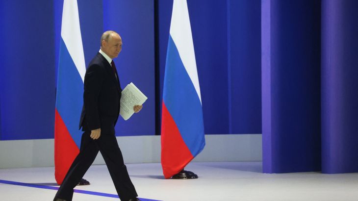 Russian President Vladimir Putin walks to deliver his annual address to the Federal Assembly in Moscow, Russia February 21, 2023. Sputnik/Sergei Karpukhin/Pool via REUTERS ATTENTION EDITORS - THIS IMAGE WAS PROVIDED BY A THIRD PARTY.