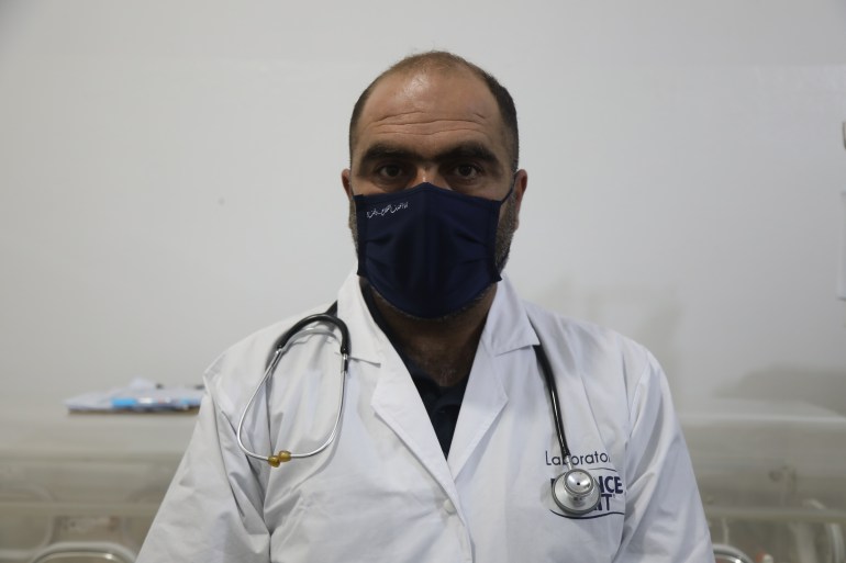 Doctor Maarouf in portrait, wearing a medical mask