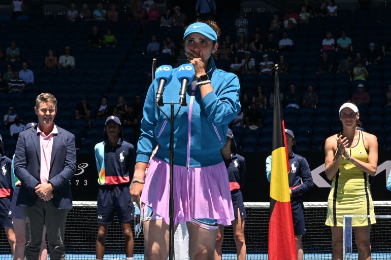 India's Sania Mirza reacts as she speaks during the awards ceremony after defeat against Brazil's Luisa Stefani and Rafael Matos during the mixed doubles final on day twelve of the Australian Open tennis tournament in Melbourne on January 27, 2023