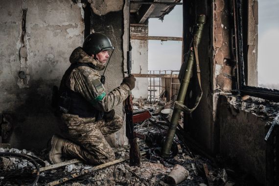 A Ukrainian serviceman of the State Border Guard Service works in a position in Bakhmut