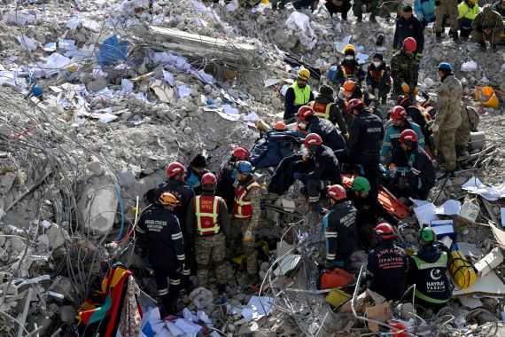 Ankara fire department and Kyrgyz search and rescue teams search the rubble of collapsed buildings in Kahramanmaras, Turkey.