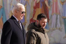 US President Joe Biden (L) walks next to Ukrainian President Volodymyr Zelensky (R) as he arrives for a visit in Kyiv on February 20, 2023. - US President Joe Biden made a surprise trip to Kyiv on February 20, 2023, ahead of the first anniversary of Russia's invasion of Ukraine, AFP journalists saw. Biden met Ukrainian President Volodymyr Zelensky in the Ukrainian capital on his first visit to the country since the start of the conflict. (Photo by Dimitar DILKOFF / AFP)