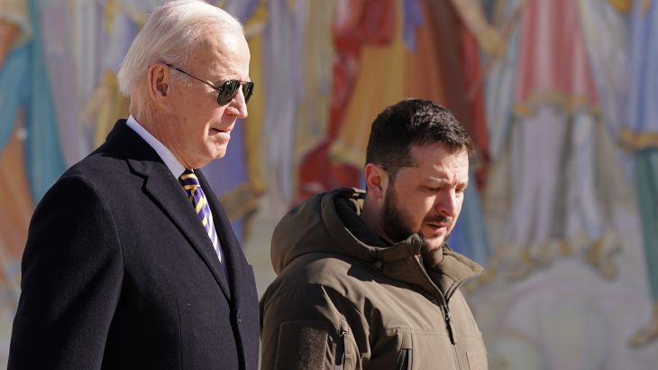 US President Joe Biden (L) walks next to Ukrainian President Volodymyr Zelensky (R) as he arrives for a visit in Kyiv on February 20, 2023. - US President Joe Biden made a surprise trip to Kyiv on February 20, 2023, ahead of the first anniversary of Russia's invasion of Ukraine, AFP journalists saw. Biden met Ukrainian President Volodymyr Zelensky in the Ukrainian capital on his first visit to the country since the start of the conflict. (Photo by Dimitar DILKOFF / AFP)