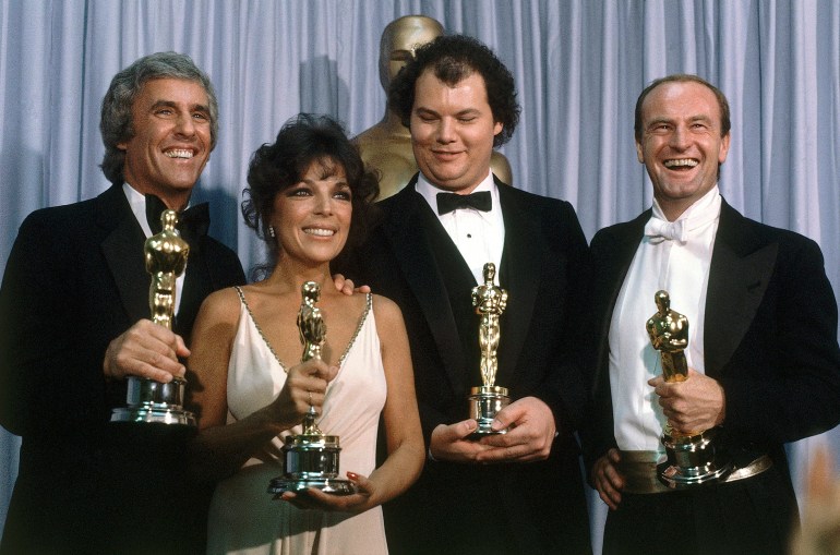 Burt Bacharach, from left, appears with Carole Bayer Sager, Christopher Cross and Peter Allen, winners of the Oscar