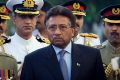 Outgoing President Pervez Musharraf is surrounded by top military officers as he leaves the Presidential House in Islamabad, Pakistan