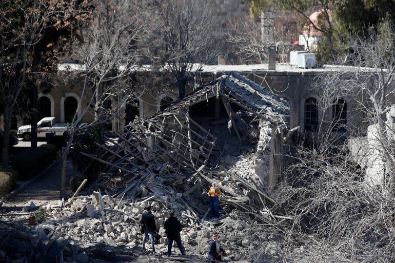 Journalists report from the damage of a medieval citadel after an early morning Israeli airstrike in the capital city of Damascus