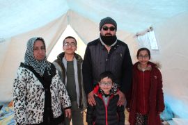 Ahmet, Ayten, and their children in an AFAD tent in Adiyaman