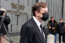 Elon Musk leaves a federal courthouse