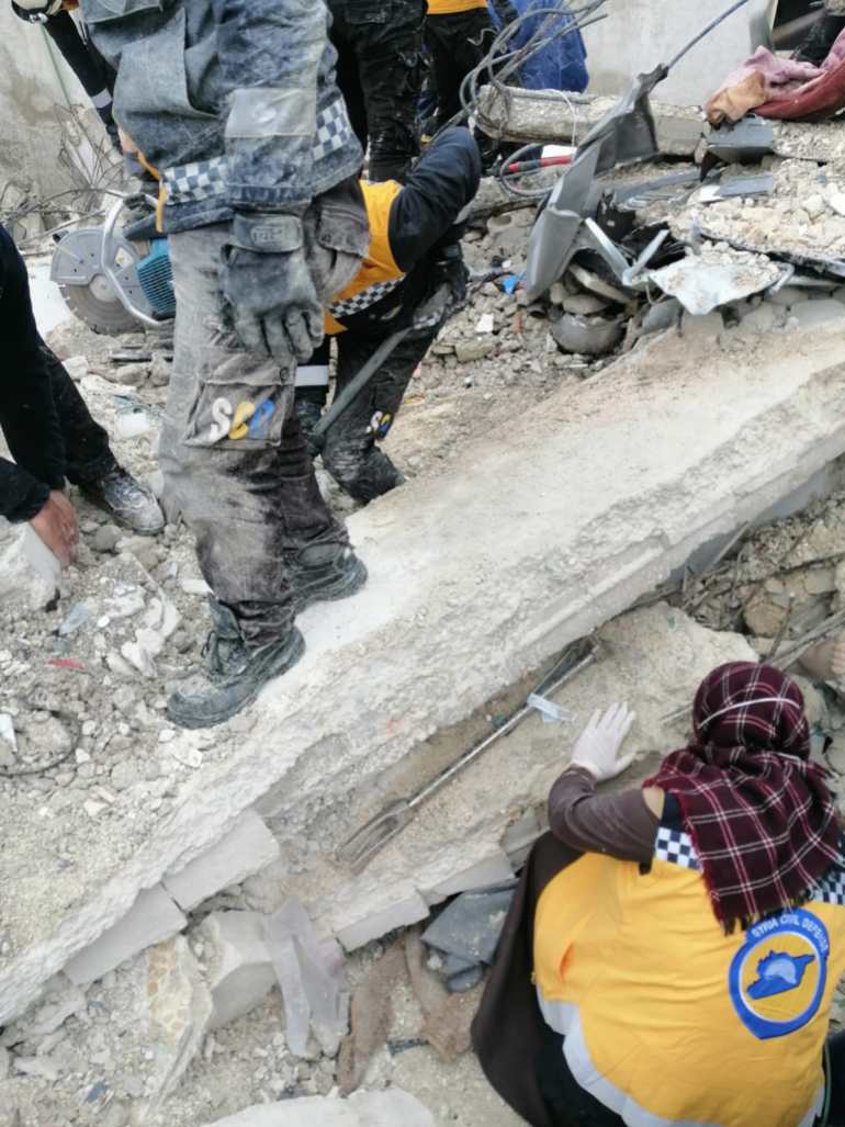 Salam al-Mahmoud looking for survivors under the rubble