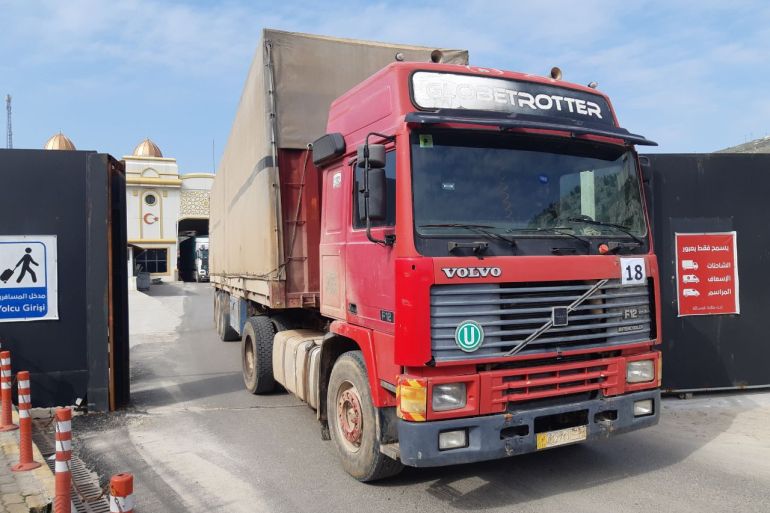 A UN aid truck entering northwest Syria from Turkey through the Bab al-Hawa crossing on Tuesday, February 14, 2023 [Ali Haj Suleiman/Al Jazeera]