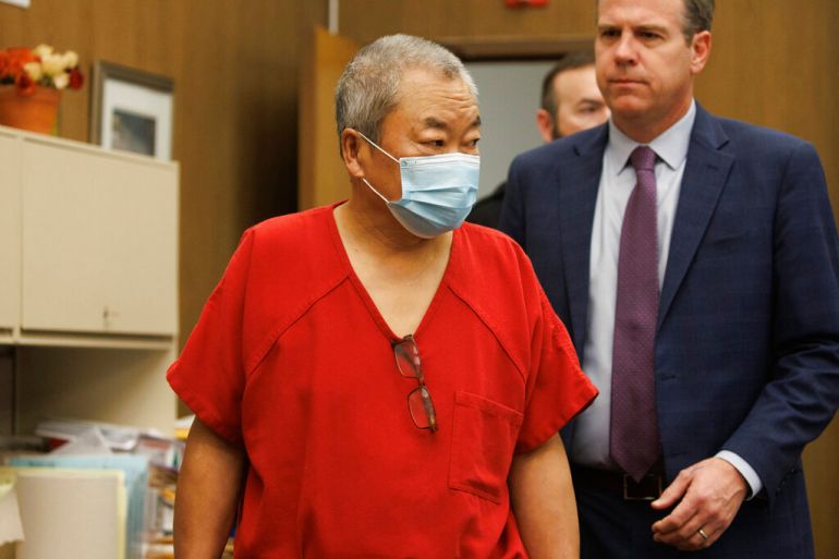 Suspected shooter Chunli Zhao appears in court in a red jail uniform