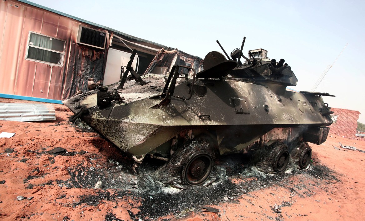 a burnt out Armoured Personnel Carrier (APC)