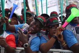 Supporters of Nigeria's ruling party All progressive Congress (APC) attend a political campaign rally in Lagos, Nigeria.