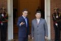 Spain's Prime Minister Pedro Sanchez gestures next to China's President Xi Jinping at the Moncloa palace in Madrid, Spain, November 28, 2018. REUTERS/Susana Vera