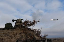 Service members of the Ukrainian Armed Forces fire a Javelin anti-tank missile during drills at a training ground in an unknown location in Ukraine, in this handout picture released February 18, 2022. Ukrainian Joint Forces Operation Press Service/Handout via REUTERS ATTENTION EDITORS - THIS IMAGE HAS BEEN SUPPLIED BY A THIRD PARTY.
