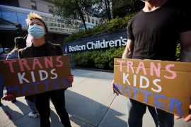 Counter-protestors gather to demonstrate against an appearance by "Billboard Chris", who opposes medical treatments for transgender youth, outside Children's Hospital in Boston, Massachusetts, U.S., September 18, 2022.