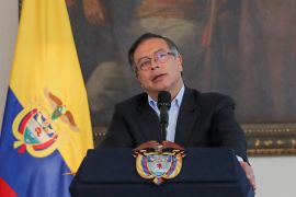 Colombian President Gustavo Petro speaks at a podium